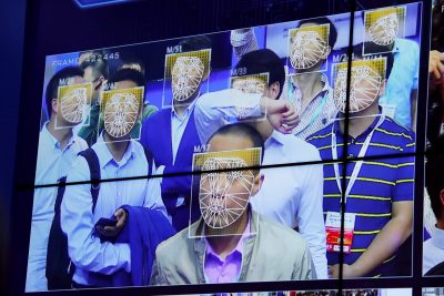 Visitors experience facial recognition technology at Face++ booth during the China Public Security Expo in Shenzhen, China 30 October 2017. (Photo: Reuters/Bobby Yip).
