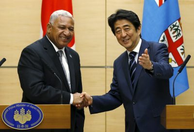 Fiji's Prime Minister Josaia Voreqe Bainimarama shakes hands with Japan's Prime Minister Shinzo Abe at the end of their joint news conference at Abe's official residence in Tokyo 19 May 2015 (Photo: Reuters/Issei Kato). 