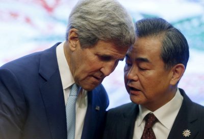 US Secretary of State John Kerry and China's Foreign Minister Wang Yi talk at the 5th East Asia Summmit at the 48th Association of Southeast Asian Nations (ASEAN) foreign ministers meeting in Kuala Lumpur, Malaysia. (Photo: Reuters)