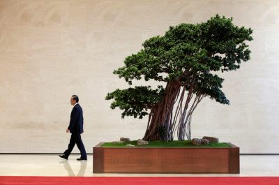 Chinese Foreign Minister Wang Yi walks outside the venue for a news conference by Chinese President Xi Jinping to conclude the Belt and Road Forum in Beijing, China, 15 May 15 2017 (Photo: Reuters/Jason Lee)