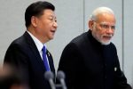 hina's President Xi Jinping and India's Prime Minister Narendra Modi arrive for a signing ceremony during Shanghai Cooperation Organization (SCO) summit in Qingdao, Shandong Province, China, 10 June 2018. (Photo: Reuters/Aly Song)