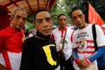 Supporters of Joko Widodo pose for pictures as they attend a campaign rally in Solo, Central Java, Indonesia, 9 April 2019 (Reuters/Willy Kurniawan).