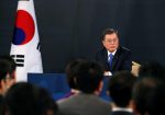 South Korean President Moon Jae-in answers reporters' question during his New Year news conference at the Presidential Blue House in Seoul, South Korea, 10 January 2018 (Photo: Reuters/Kim Hong-Ji).