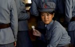 A soldier eats ice cream in Pyongyang, North Korea, 12 September 2018 (Photo: Reuters/Danish Siddiqui).