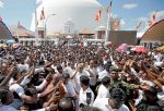 Sri Lanka's President Gotabaya Rajapaksa waves at his supporters as he leaves the presidential swearing-in ceremony in Anuradhapura, Sri Lanka, 18 November 2019 (Photo: Reuters/Dinuka Liyanawatte).
