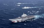 China's Liaoning aircraft carrier with accompanying fleet conducts a drill in an area of South China Sea, December 2016 (Photo: Reuters/Stringer).