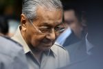 Malaysia's former prime minister Mahathir Mohamad leaves after an event in Kuala Lumpur, Malaysia, 28 February 2020 (Reuters/Lim Huey Teng).