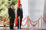 China’s President Xi Jinping and Kyrgyzstan’s President Sooronbay Jeenbekov attend a welcoming ceremony ahead of their talks in Bishkek, Kyrgyzstan 13 June 2019 (Reuters/Vladimir Pirogov).