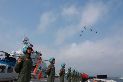 Navy personnel of Chinese People's Liberation Army (PLA) Navy take part in a military display in the South China Sea, 12 April 2018 (Photo: Reuters/Stringer).