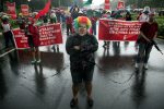 A protestor wears a mask with the face of President Rodrigo Duterte and a clown wig during a rally against the anti-terrorism bill on Independence Day, in University of the Philippines, Quezon City, Metro Manila, Philippines, 12 June, 2020 (Photo: Reuters/Lopez).