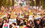 South Koreans attend a rally demanding prosecution reform near the Supreme Public Prosecutors' Office in Seoul, South Korea, 12 October 2019 (Photo: Reuters/Lee Jae-Won).