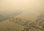 An aerial view of Palembang city covered by smoke from the forest fire in South Sumatra province, Indonesia, 14 October 2019 (Photo: Antara Foto/Nathan via Reuters).