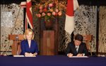 UK International Trade Secretary Liz Truss and Japan's Minister for Foreign Affairs Toshimitsu Motegi sign the UK-Japan Comprehensive Economic Partnership Agreement (CEPA) (Photo: Reuters/Deutsche Presse-Agentur GmbH)
