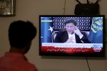A television screen displays Prime Minister of Pakistan Imran Khan, announcing the extension of a country-wide lockdown for two weeks, due to the ongoing spread of the coronavirus disease (COVID-19), in Karachi, Pakistan, 14 April 2020 (Photo: Reuters/Akhtar Soomro).