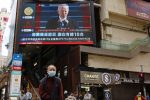 A TV screen shows news of US President Joe Biden after his inauguration, in Hong Kong, China, 21 January 2021 (Photo: Reuters/Tyrone Siu).