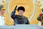 North Korean leader Kim Jong-un gestures during a parade in Pyongyang, 15 January 2021 (Photo: KCNA via Reuters).