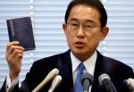 Fumio Kishida, Japan's ruling Liberal Democratic Party (LDP) lawmaker and former foreign minister, shows his notebook during a news conference as he announces his candidacy for the party's presidential election in Tokyo, Japan, 26 August 2021 (Photo: Reuters/Issei Kato).