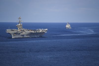 The Nimitz-class aircraft carrier USS Carl Vinson (CVN 70) and Ticonderoga-class guided-missile cruiser USS Lake Champlain (CG 57) transit the South China Sea, 4 November 2021 (Photo: REUTERS/Tyler R. Fraser)