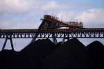 Coal is unloaded onto large piles at the Ulan Coal mines near the central New South Wales rural town of Mudgee in Australia, 8 March 2018 (Photo: Reuters/ David Gray).