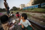Children play on railway tracks at a slum in Yangon, 14 January 2013. (Photo: REUTERS/Minzayar)