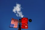 The flags of the United States and China fly from a lamppost in the Chinatown neighborhood of Boston, Massachusetts, United States, 1 November 2021 (Photo: Reuters/Brian Snyder).