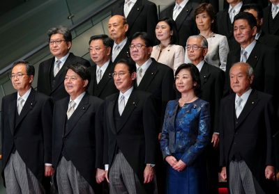 Japanese Prime Minister Fumio Kishida poses with newly appointed ministers at Prime Minister's official residence in Tokyo, Japan, 10 November 2021 (Photo: Reuters/Kimimasa Mayama)
