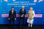US President Joe Biden poses with India Prime Minister Narendra Modi (left) and Japan Prime Minister Fumio Kishida as he announced the countries that are joining the new Indo-Pacific Economic Framework during his visit to Tokyo (Photo: Reuters).