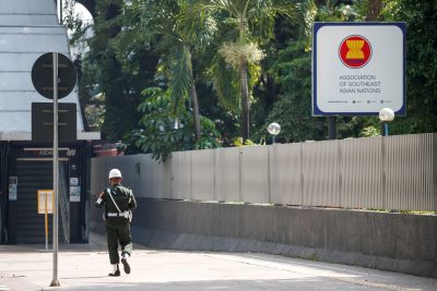 A military policeman patrols outside the Association of Southeast Asian Nations (ASEAN) secretariat building, before the ASEAN leaders' meeting in Jakarta, Indonesia, 24 April 2021 (Photo: Reuters/Willy Kurniawan).