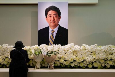 A mourner pays respects to late former Japanese Prime Minister Shinzo Abe, who was shot while campaigning for a parliamentary election, in Taipei, Taiwan, 11 July 2022 (Photo: Reuters/Ann Wang).