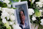 A picture of late former Japanese prime minister Shinzo Abe is seen at Headquarters of the Japanese Liberal Democratic Party in Tokyo, Japan, 12 July 2022 (Photo: Reuters/Kim Kyung-Hoon).