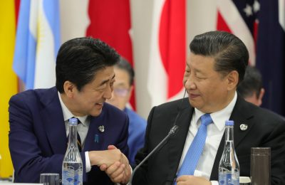 Japan's former prime minister Shinzo Abe shakes hands with China's President Xi Jinping during the G20 summit in Osaka, Japan on 28 June 2019. (Photo:Sputnik/Mikhail Klimentyev)