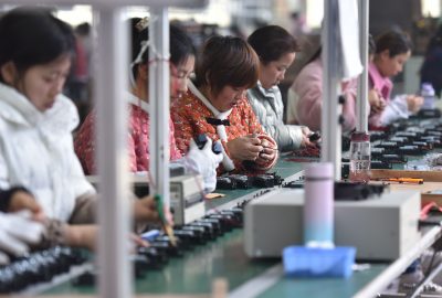 Workers at a loudspeaker production factory in Fuyang, China, February 28, 2022 (Photo: Reuters/Sheldon Cooper)