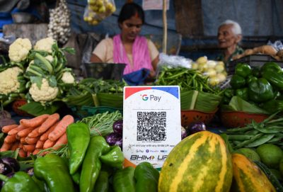 A Unified Payment Interface (UPI) barcode is kept at a vegetable stall for customers to make digital payment in Mumbai.  The Unified Payments Interface (UPI) recorded over six billion transactions in the month of July 2022 in India, which is the highest ever by a digital payment platform since its launch in 2016. (Ashish Vaishnav / SOPA Images / Sipa USA via Reuters Connect)