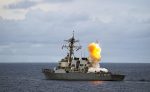The Arleigh Burke-class guided-missile destroyer USS Benfold fires a standard missile at a target drone as part of a surface-to-air-missile exercise, South China Sea, July 2022 (Photo: via Reuters).