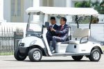 Indonesian President Joko Widodo and Malaysia's Prime Minister Anwar Ibrahim ride in a buggy car during their meeting at the Presidential Palace in Bogor, Indonesia, 9 January 2023 (Photo: Reuters/Willy Kurniawan).