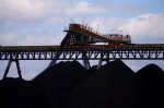 Coal is unloaded onto large piles at the Ulan Coal mines near the central New South Wales rural town of Mudgee, Australia on 8 March 2018 (Photo: David Gray/Reuters via File Photo).