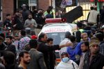 People gather outside a hospital following a deadly mosque bombing in Peshawar, Pakistan, 1 February, 2023 (Photo: Reuters).