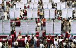 People attend a job fair for university graduates at a gymnasium in Hefei, Anhui province, China, 4 September 2023 (Photo: Reuters/China Daily).